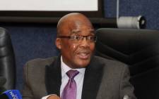 Minister of Health Aaron Motsoaledi speaking to the members of the media on the upcoming World AIDS day. Picture: GCIS.