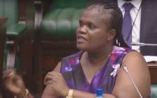 FILE: A screengrab of Communications Minister Faith Muthambi answering questions in Parliament.