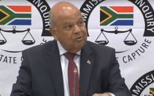 A screengrab of Public Enterprises Minister Pravin Gordhan appearing at the Zondo commission of inquiry on 20 November 2018.