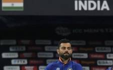India's captain Virat Kohli walks into the field after India's victory at the end of the ICC men’s Twenty20 World Cup cricket match between India and Namibia at the Dubai International Cricket Stadium in Dubai on November 8, 2021. Picture: Aamir Qureshi / AFP