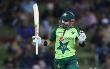 Pakistan batsman Mohammad Rizwan celebrates reaching his half century (50 runs) during the third T20 cricket match between New Zealand and Pakistan at McLean Park in Napier on 22 December 2020. Picture: AFP