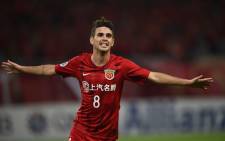 This file photo taken on 21 May 2019 shows Shanghai SIPG's Oscar celebrating after scoring a goal during the AFC Champions League football match between Shanghai SIPG and Ulsan Hyundai in Shanghai. Picture: AFP