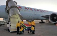 Over 300 South African firefighters board a Boeing 777 to Canada to assist Fort McMurray in battling raging wild fires, which have been blazing for over a month. 29 May 2016. Picture: Supplied. 