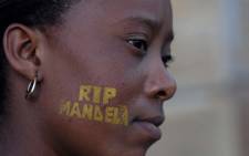 A woman pays tribute to former president Nelson Mandela lying in state on 12 December 2013. Picture: GCIS.