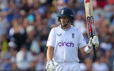 England's Joe Root celebrates his half-century on Day 4 of the fifth cricket Test match between England and India at Edgbaston, Birmingham in central England on 4 July 2022. Picture: Geoff Caddick/AFP