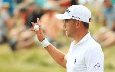 FILE: Justin Thomas of the United States reacts after making a birdie. Picture: AFP.