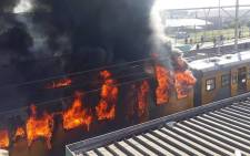FILE: A Metrorail train on fire at the Koeberg station in Cape Town on 21 August 2018. Picture: One Second Traffic Alerts
