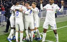 Lyon players celebrate a goal against Juventus in their UEFA Champions League match on 26 February 2020. Picture: @OL_English/Twitter