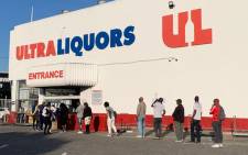 FILE: Customers queue outside the Ultra Liquors in Wynberg, Cape Town following the relaxation of alcohol sale restrictions on 1 June 2020. Picture: Kaylynn Palm/EWN