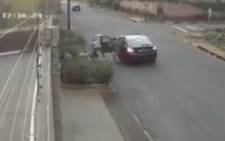 A screengrab of CCTV footage showing a woman being attacked during an attempted robbery in Auckland Park, Johannesburg.