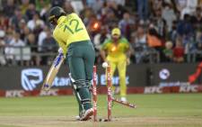 South Africa's Quinton de Kock is bowled by Australia's Mitchell Stark (unseen) during the third and final T20 international cricket match between South Africa and Australia at Newlands Cricket Stadium in Cape Town, on 26 February 2020. Picture: AFP