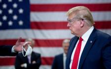 FILE: President Donald Trump, with an eye on his re-election prospects in November, has pressed for a further reopening of the United States as job losses mount from coronavirus shutdowns. Picture: AFP
