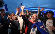 France's supporters celebrate France's 1-0 victory over Belgium during the semifinals of Russia 2018 World Cup football tournament outside the Saint Petersburg Stadium on 10 July 2018. Picture: AFP