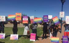 Members of the LGBTI community are picketing outside the Grace Bible Church. Picture: Twitter @leloe_m
