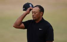 FILE: Tiger Woods of the United States reacts on the 18th green during the first round of the 115th US Open Championship at Chambers Bay on 18 June, 2015 in University Place, Washington. Picture: AFP.