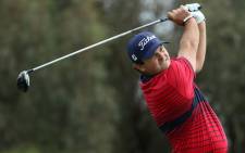 Patrick Reed hits his tee shot on the 12th hole during the final round of the Farmers Insurance Open at Torrey Pines South on 31 January 2021 in San Diego, California. Picture: Katelyn Mulcahy/AFP