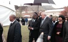 Former presidents Thabo Mbeki and FW de Klerk walk with Russel Botman's family into the DF Malan Memorial Centre on 5 July 2014. Picture: EWN.