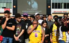 FILE: Fans gather to mourn the death of NBA legend Kobe Bryant outside Staples Center in Los Angeles, California on 27 January 2020. Picture: AFP
