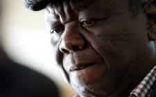 FILE: Zimbabwean presidential hopeful Morgan Tsvangirai speaks in Harare on 1 August 2013. Picture: AFP.
