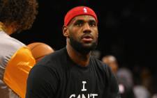 NEW YORK, NY  LeBron James #23 of the Cleveland Cavaliers wears an I Cant Breathe shirt during warmups before his game against the Brooklyn Nets during their game at the Barclays Center on 8 December, 2014 in New York City. Picture: AFP.