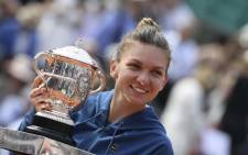 Simona Halep holding the trophy after winning the French Open final against Sloane Stephens. Picture: @rolandgarros/Twitter.