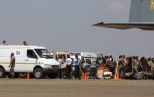 The plane carrying 25 South Africans, including three children, who were injured in the Lagos building collapse more than week ago landed at the Swartkop Air Force Base in Pretoria on 22 September 2014. Picture: Christa Eybers/EWN.