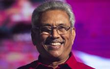 Sri Lanka Podujana Peramuna (SLPP) party presidential candidate Gotabaya Rajapaksa smiles during a campaign rally in Homagama on 13 November, ahead of the November 16 presidential election. Picture: AFP