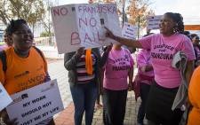 A group of demonstrators strongly opposed bail for the four men linked to the rape and murder of Franziska Blochliger outside the Wynberg Magistrate's Court on 5 April 2016. Picture: Aletta Harrison/EWN