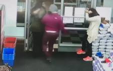 Video shows customer throwing punches over price of hair weave.