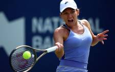 Simona Halep of Romania hits a shot against Beatriz Haddad Maia of Brazil during the singles final of the National Bank Open, part of the Hologic WTA Tour, at Sobeys Stadium on 14 August 2022 in Toronto, Ontario, Canada. Picture: Vaughn Ridley/Getty Images/AFP