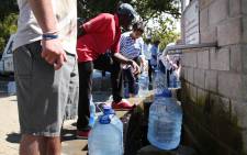 FILE: Cape Town residents collecting water at the Newlands springs in Cape Town. Picture: Bertram Malgas/EWN.