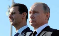 Syrian President Bashar al-Assad and Russian President Vladimir Putin at a meeting in the Black Sea resort of Sochi in Russia on 17 May 2018. Picture: Reuters.