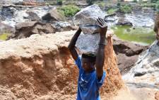 FILE: Children working at a mine site in Burkina Faso. Picture: UNICEF