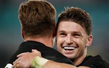 New Zealand's full back Beauden Barrett (R) congratulates New Zealand's fly-half Jordie Barrett after he scored a try during the Japan 2019 Rugby World Cup quarter-final match between New Zealand and Ireland at the Tokyo Stadium in Tokyo on 19 October 2019. Picture: AFP