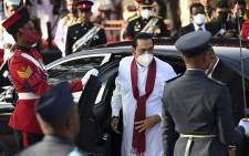 FILE:Sri Lanka's Prime Minister Mahinda Rajapaksa (C) arrives during the Sri Lanka's 74th Independence Day celebrations in Colombo on February 4, 2022. Picture: AFP