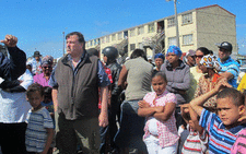 Western Cape Education MEC Donald Grant addresses Hanover Park residents during a march against gangsterism on 17 November 2012. Picture: Shamiela Fisher/EWN
