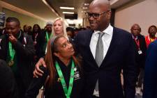 Sports Minister Nathi Mthethwa (right) welcomes home Banyana Banyana head coach Desiree Ellis (left) at the OR Tambo International Airport on 26 July 2022 after the team's victory at the Women's Africa Cup of Nations in Morocco on 23 July 2022. Picture: GCIS