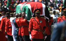 Military officers carrying the coffin of the late former Kenyan President, Daniel Arap Moi, draped in the Kenya national flag, during a state funeral service in Nairobi on 11 February 2020. Picture: AFP
