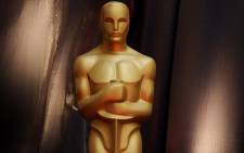 A large Oscar statue along the red carpet. Picture: EPA/Paul Buck.