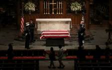The flag-draped casket of former US President George HW Bush sits in repose inside of St. Martins Episcopal Church on 5 December, 2018 in Houston, Texas. Picture: AFP