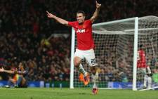 Manchester United's Robin Van Persie celebrates his goal against Olympiakos in the Champions League match on 19 March 2014. Picture: Facebook.
