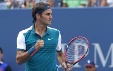 Roger Federer of Switzerland celebrates after defeating Leonardo Mayer of Argentina during their 2015 US Open Men’s Singles round 1 match at the USTA Billie Jean King National Tennis Center 1 September, 2015 in New York. Picture: AFP. 