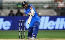 India's Kedar Jadhav plays a shot during the third one-day international cricket match between Australia and India at the Melbourne Cricket Ground in Melbourne on 18 January 2019. Picture: AFP