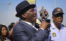 Police Minister Bheki Cele addresses community members in Browns Farm Near near Nyanga. The minister visited the area after the death of four people. Picture: Cindy Archillies/EWN