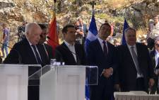 Greek and Macedonian leaders, along with UNSG Personal Envoy Matthew Nimetz, sign an agreement resolving the name issue in the presence at Lake Prespa on 17 June 2018. Picture: @GreeceMFA/Twitter