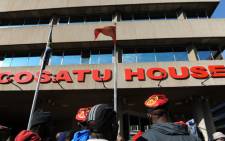 A group of protesters gather outside Cosatu headquarters in Johannesburg on Friday, 24 May 2013 after the march against e-tolls was cancelled. Picture: Sapa.