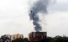 Smoke can be seen billowing out of the Westgate Shopping Mall in Nairobi on 23 September 2013 after an explosion. Picture: via Twitter