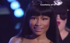 Nicki Minaj confronts Miley Cyrus on stage at the MVA’s after accepting her award. Picture:CNN/screengrab