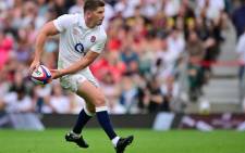 England's fly-half Owen Farrell passes the ball during the Summer Series international rugby union match between England and Wales at Twickenham Stadium, south-west London, on 12 August 2023. Picture: Ben Stansall / AFP