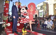 Minnie Mouse poses with Disney CEO Bob Iger and singer Katy Perry while being honoured with the 2,627th star on the Hollywood Walk of Fame on 22 January 2018 in Hollywood, California. Picture: AFP
